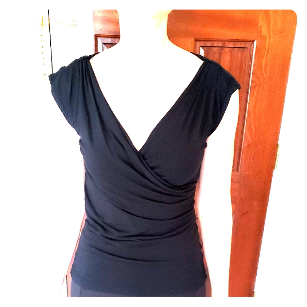 White house black market sleeveless black shirt